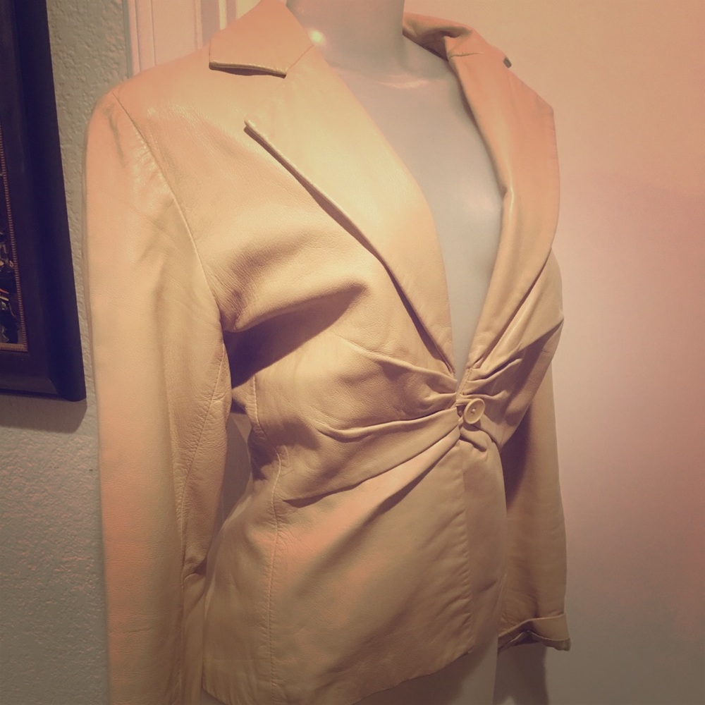 Super stylish cream leather jacket.
